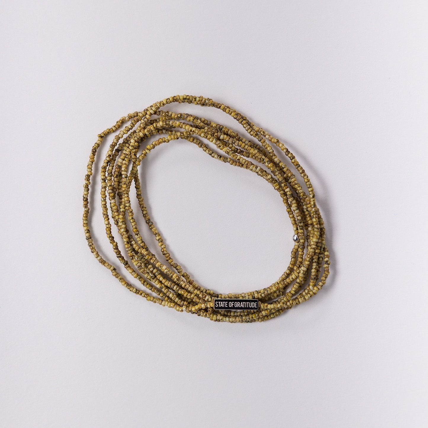 Pulsera de gratitud con forma de plátano