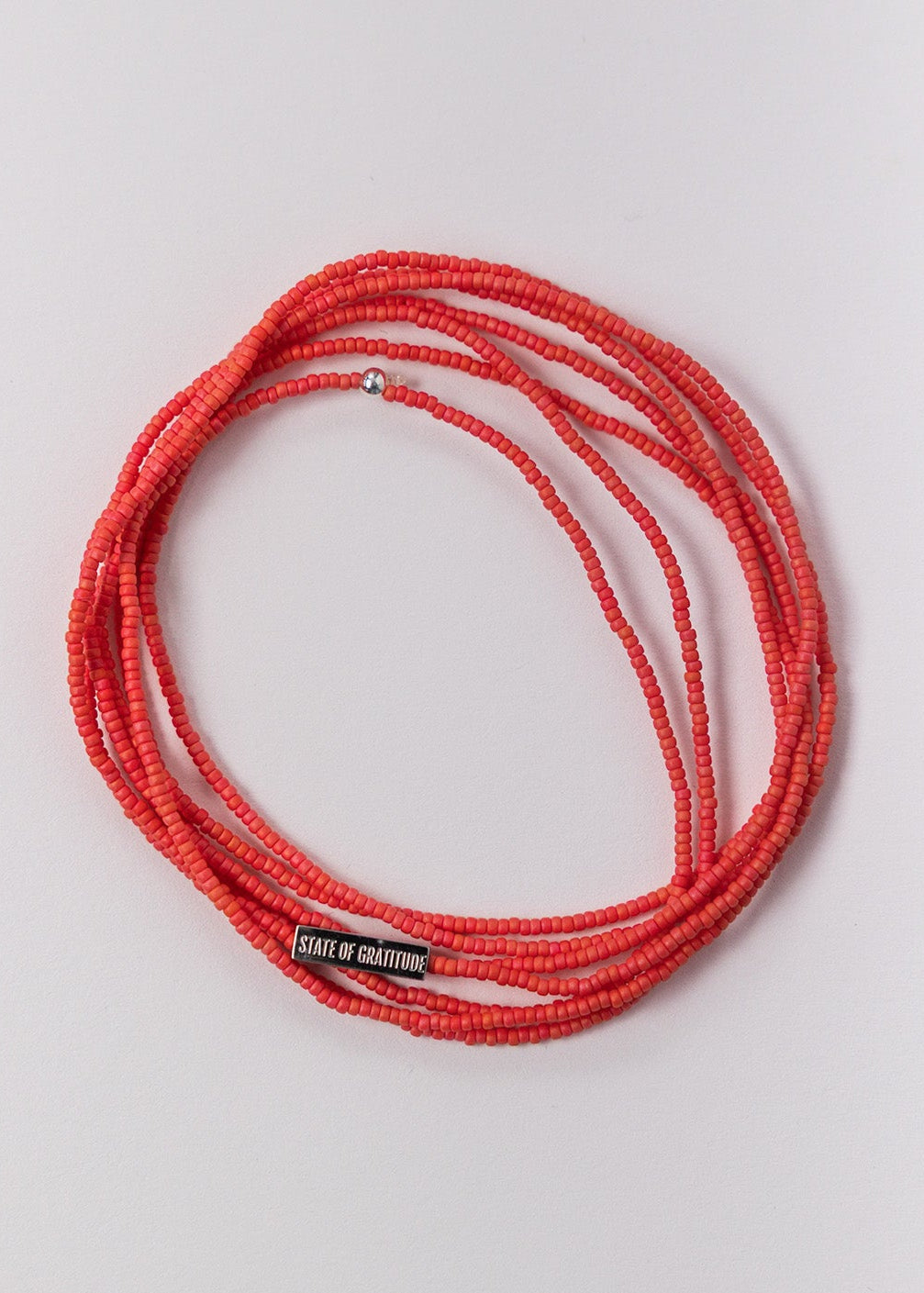 Pulsera de gratitud de coral