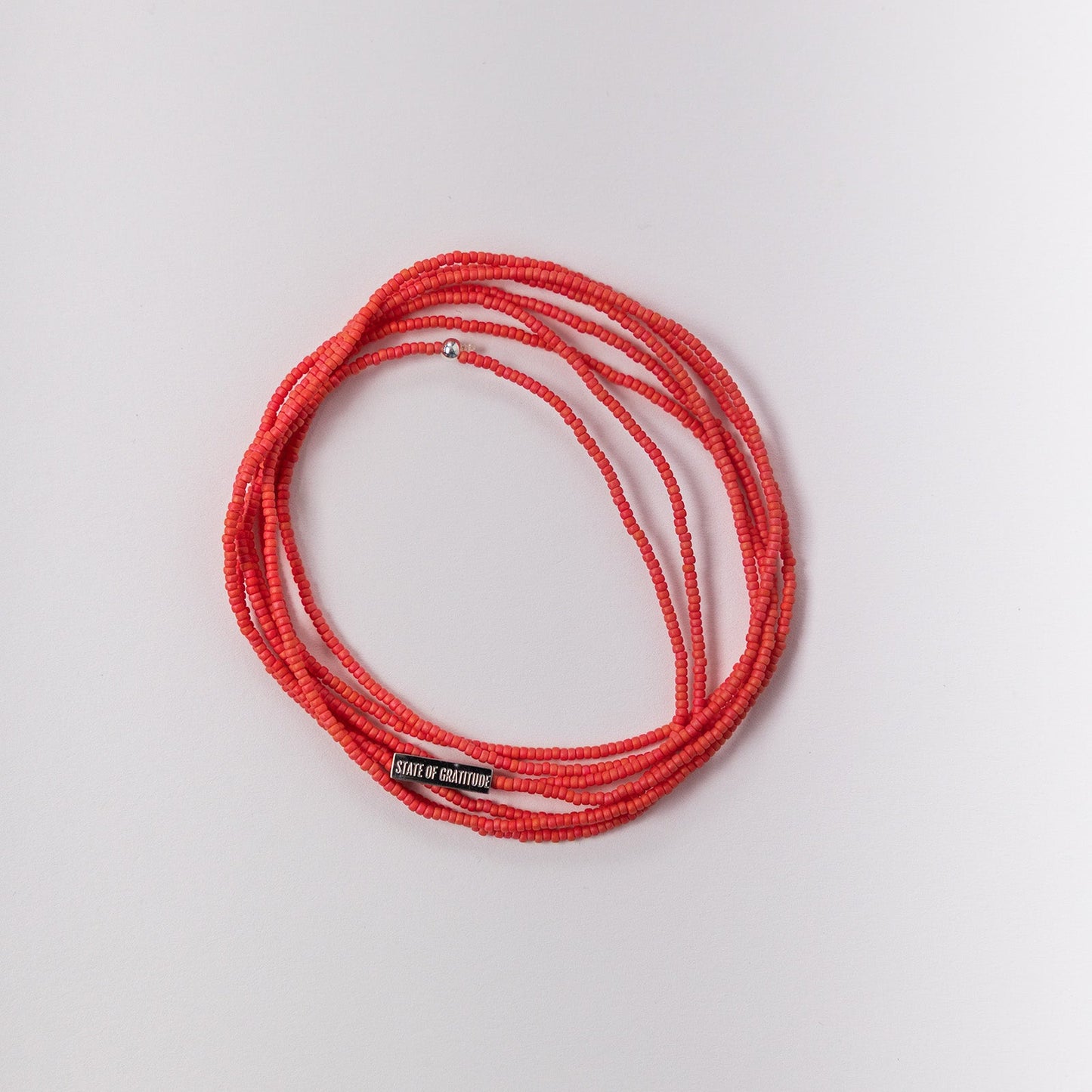 Pulsera de gratitud de coral