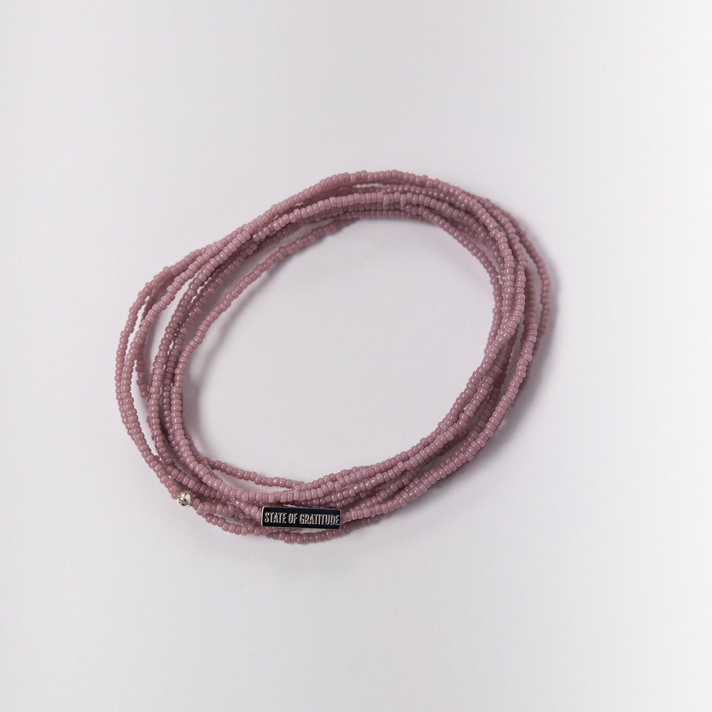 Pulsera de gratitud malva