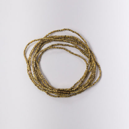 Pulsera de gratitud con forma de plátano